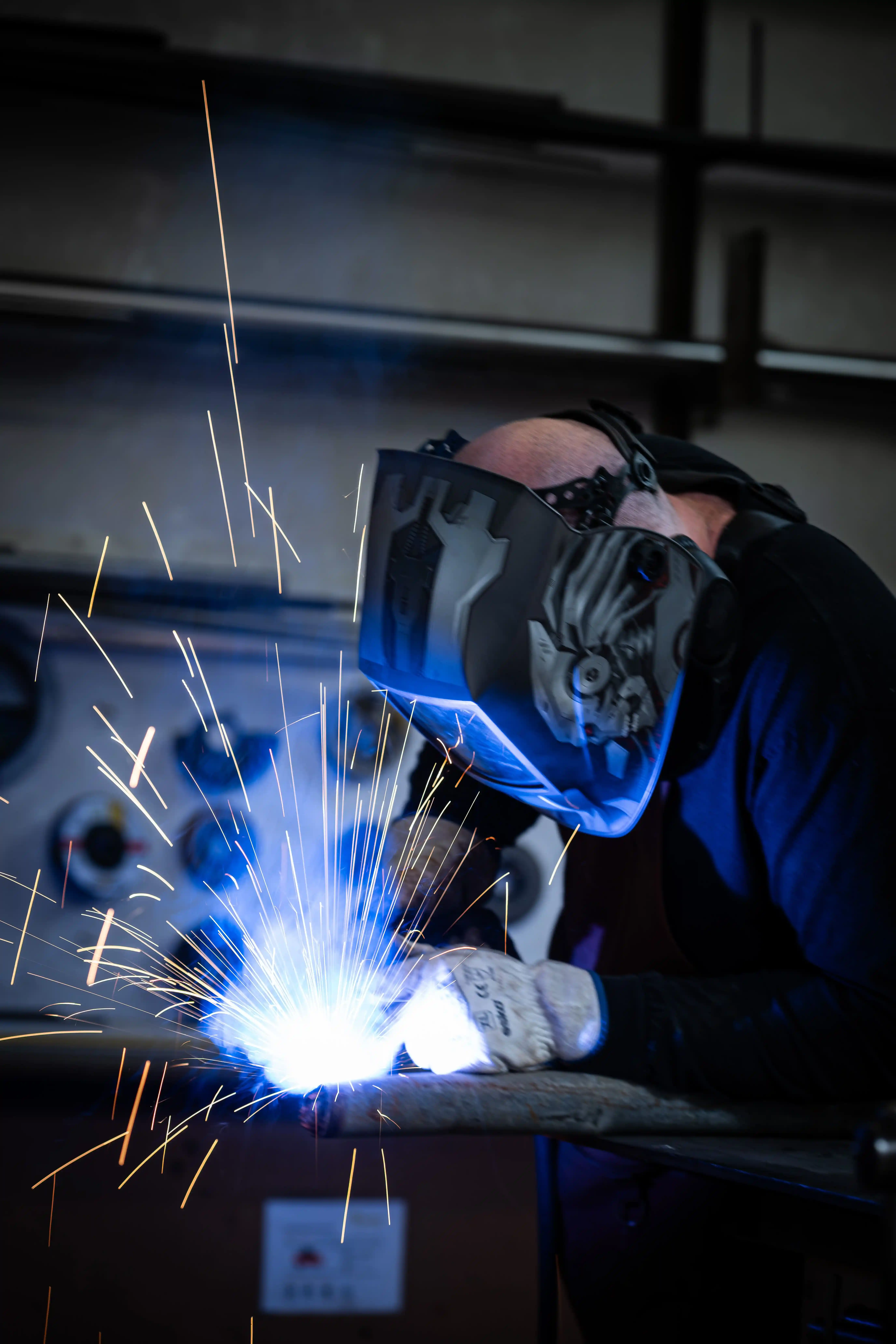 Welding — sparks and blue light